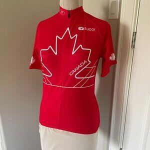 SUGOI Men's Size Small Cycling Jersey Canada Logo Red White 3/4 Zip Short Sleeve